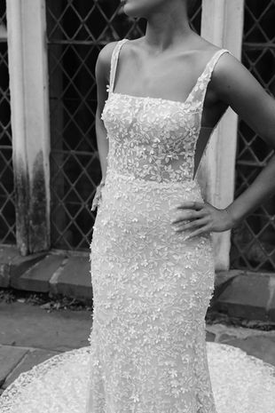 The Milly wedding dress by Evie Young. Fitted wedding dress, detachable sleeved wedding dress, off the shoulder wedding dress, simple wedding dress. wedding dress shop farnham, wedding dress shops in Surrey, corseted wedding dress, wedding dress shop near london, wedding dress shop near Guildford. Lace wedding dress.