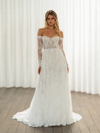 The Trina wedding dress from Madi Lane, soft A-line wedding dress, lace wedding dress, sweetheart neckline wedding dress, wedding dress with sleeves, pretty wedding dress, plus size wedding dress, boho wedding dress, garden wedding, bohemian wedding dress.