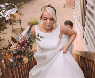 Bride coming up the stairs