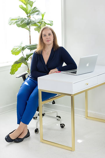 Headshot At desk.jpg