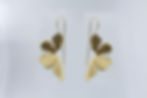 Elegant orchid-shaped earrings inspired by blooming flowers — floral statement jewelry with delicate petal details, perfect for nature-inspired or botanical fashion trends
