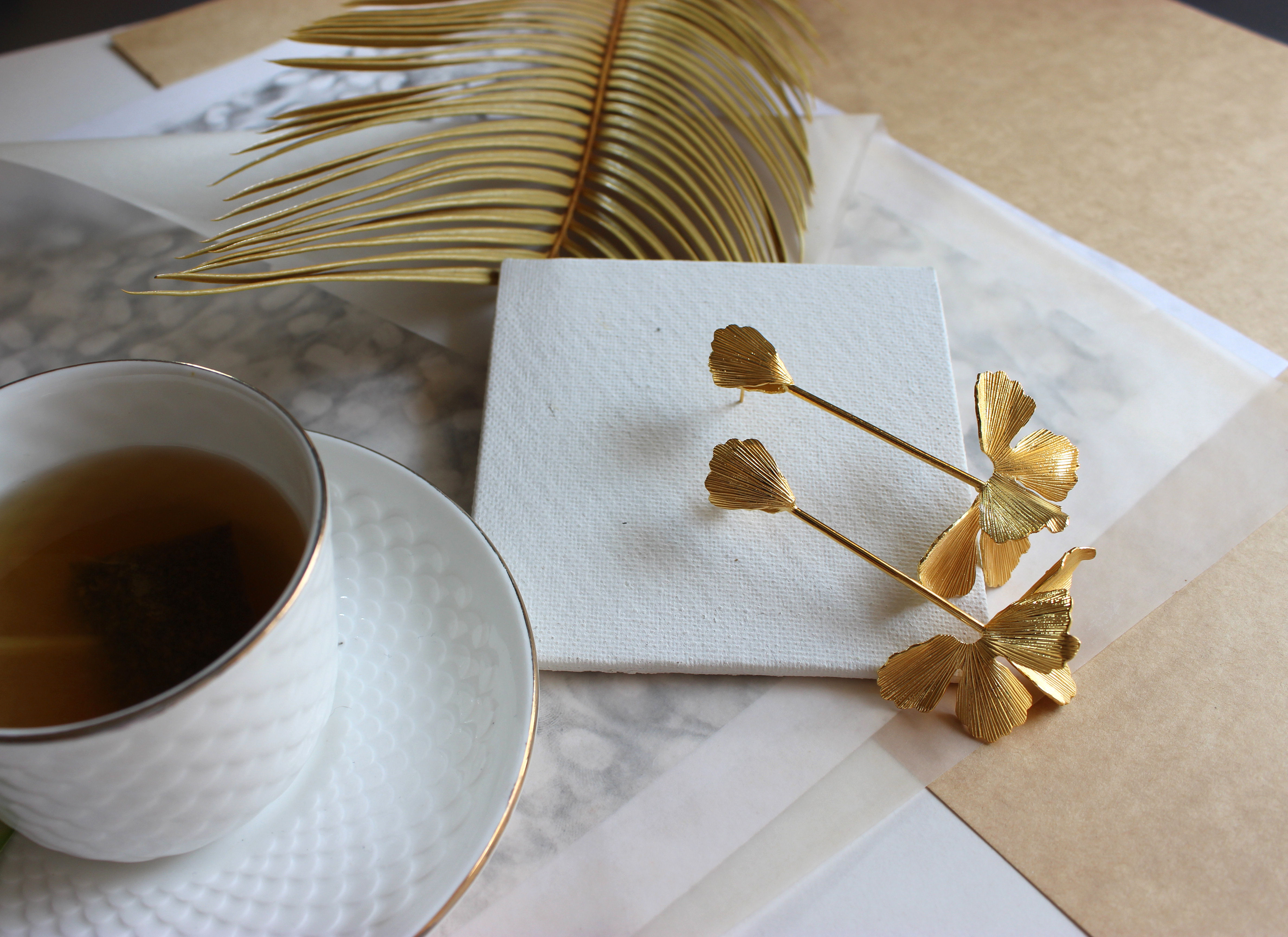 Elegant orchid-shaped earrings inspired by blooming flowers — floral statement jewelry with delicate petal details, perfect for nature-inspired or botanical fashion trends