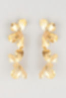 Elegant orchid-shaped earrings inspired by blooming flowers — floral statement jewelry with delicate petal details, perfect for nature-inspired or botanical fashion trends
