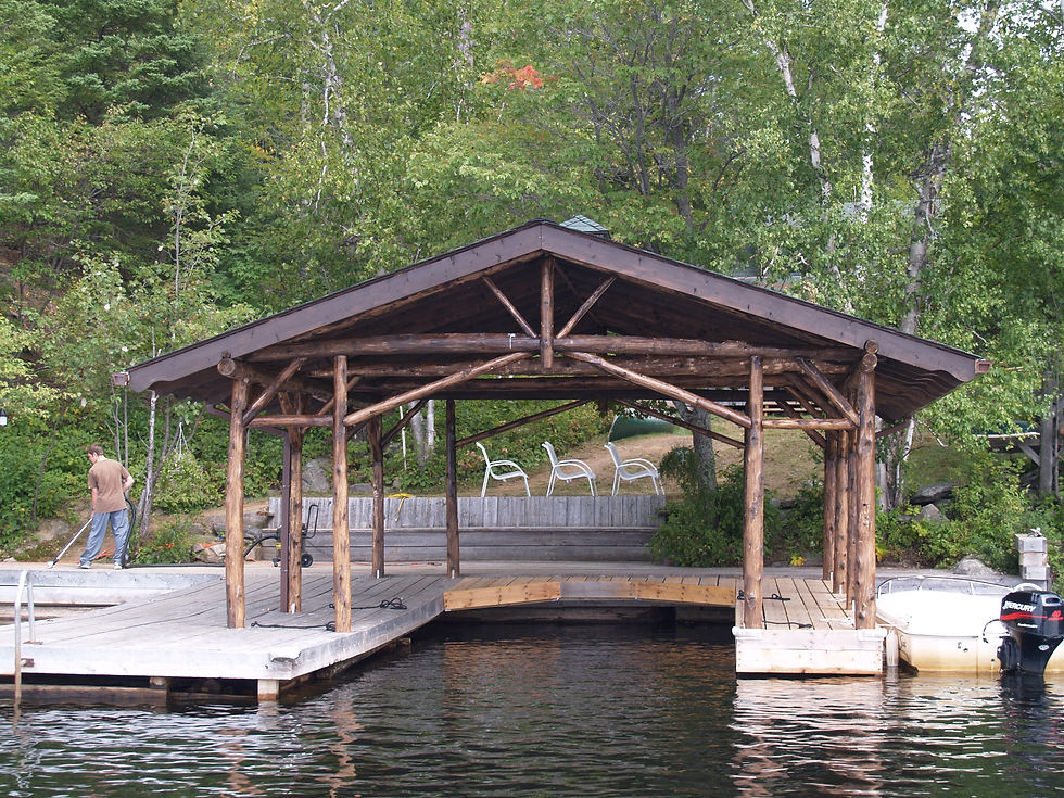 Round log post & beam boathouse