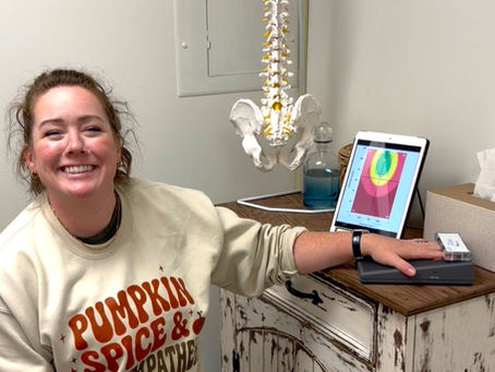 Dr. Kate performing a NeuroPULSE HRV nervous system scan at Flourish Wellness Practice.