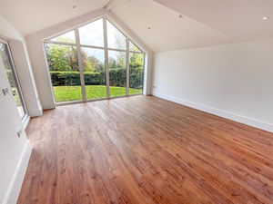Bright interiors set off by natural timber flooring continuing the rural feel on the interior of the property.
