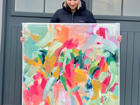 Framing paintings ahead of Artists Open House in May 2025