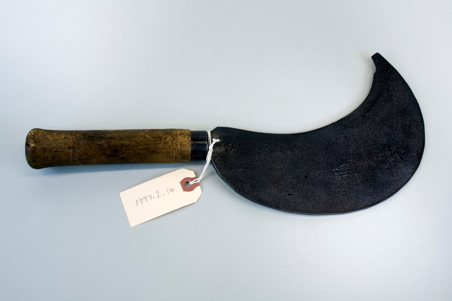 Experton-Revollier, Billhook, c. 19th century. Iron, wood. Gift of Kenneth Lynch & Sons, 1997.2.16.