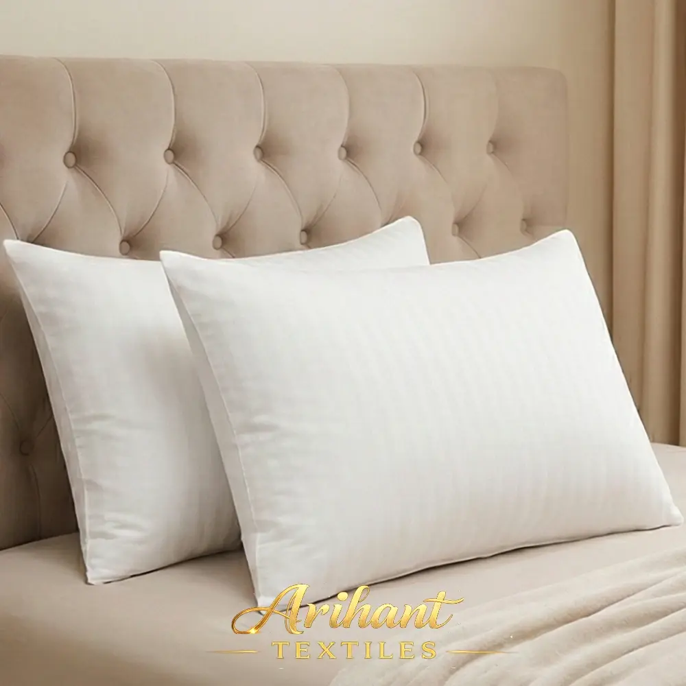 White satin stripe pillow manufactured by Arihant Textiles, a leading bed pillow manufacturer in Panipat for bulk global supply.