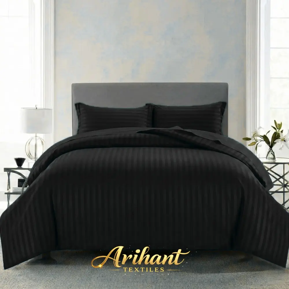Black stripes hotel duvet cover manufactured by Arihant Textiles, a leading hotel linen manufacturer in Panipat for bulk supply.