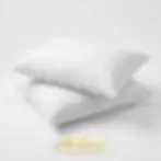 High-loft plain white bed pillow with breathable cotton casing and premium virgin fiber filling.