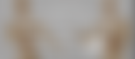 Wooden mannequins in a creative writing course ad titled "Character Creation: How to Bring Your Story to Life," Lesson IV.