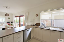 Overlooking dining to outdoor patio