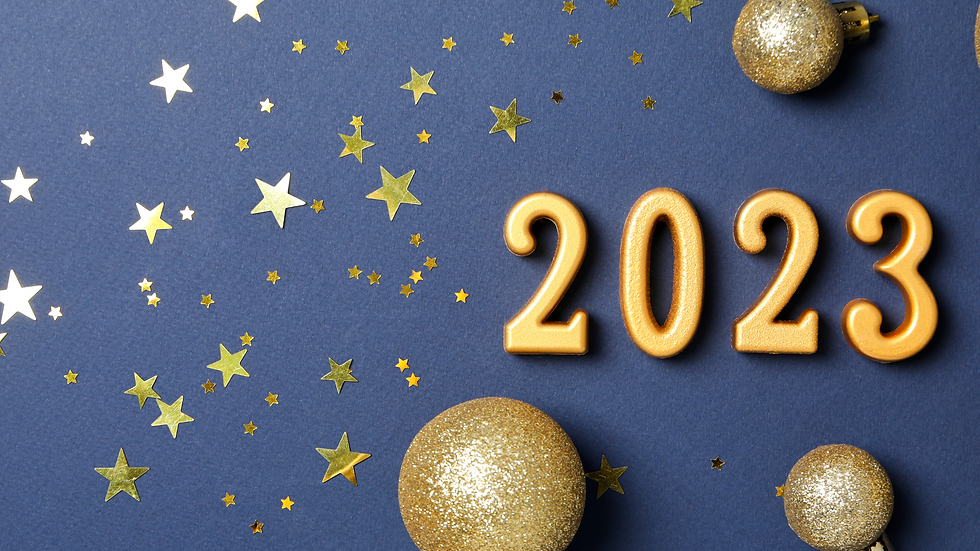 Blue paper with gold stars that says 2023