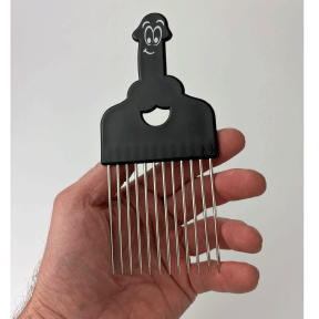 Novelty Hair pick in the shape of a cartoon penis