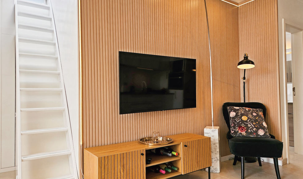 Lounge area with television in Casa Gran Canaria holiday home