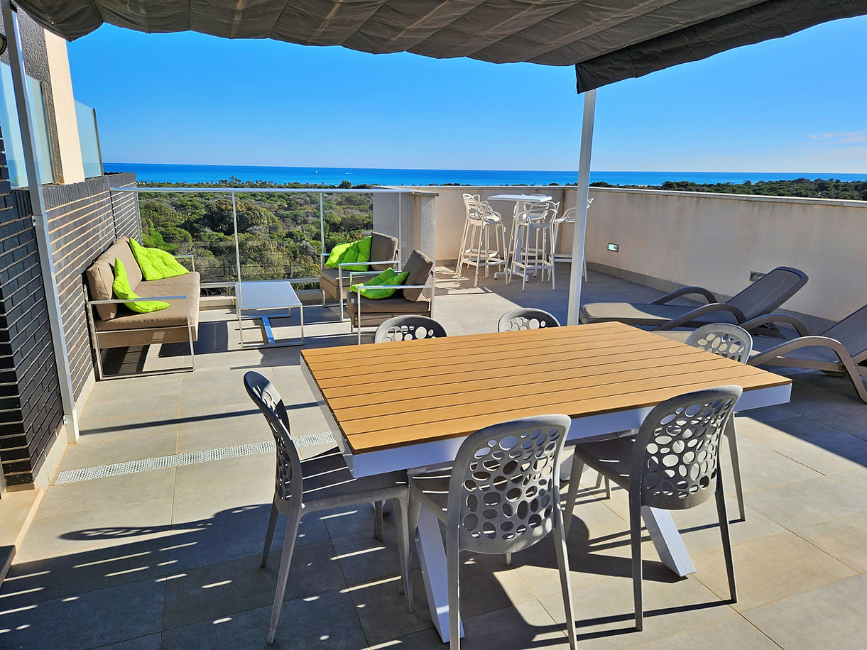 Rooftop terrace with lounge at Casa Costa Blanca holiday home overlooking nature reserve and Mediterranean Sea