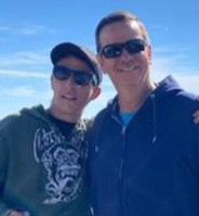 A picture of Joe Francis and his son