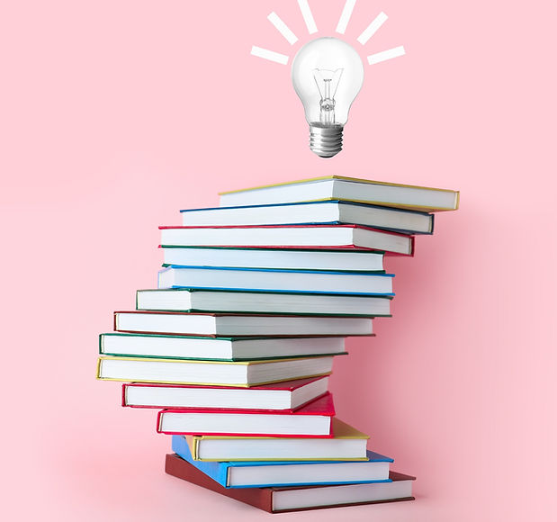 Books and light bulb on pink background Invention concept_edited.jpg