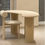 Thumbnail: Microcement  Curved Desk Table with Three Cylinder Bases