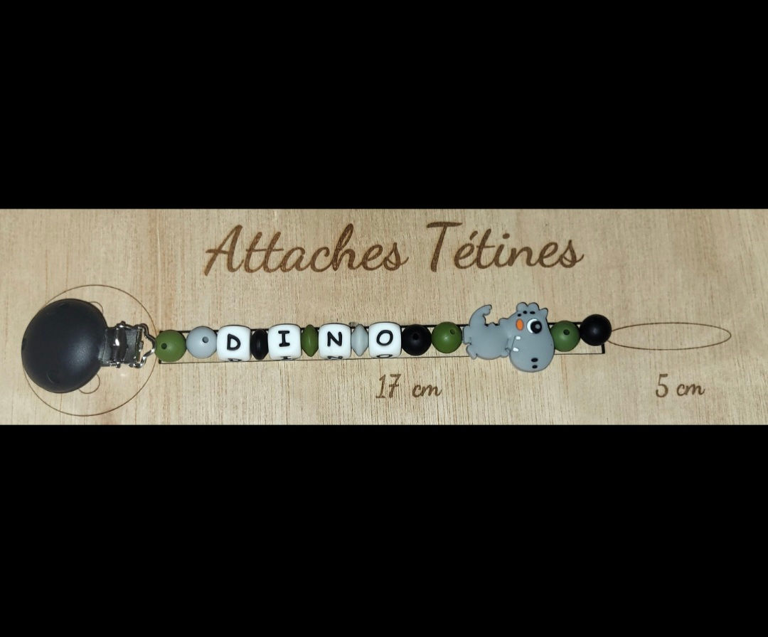 Attache tétine DINOSAURE