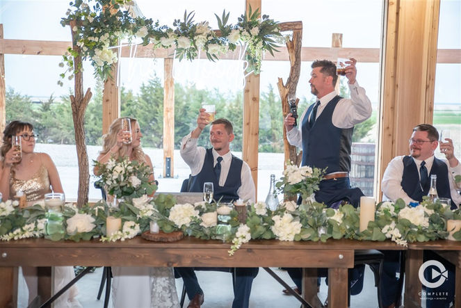 log arch with flowers