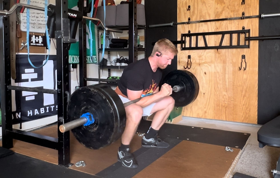 Performing Zercher Squats in my garage gym