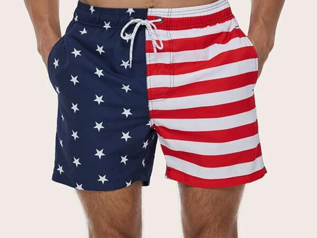 Eye-level view of red, white, and blue swim trunks