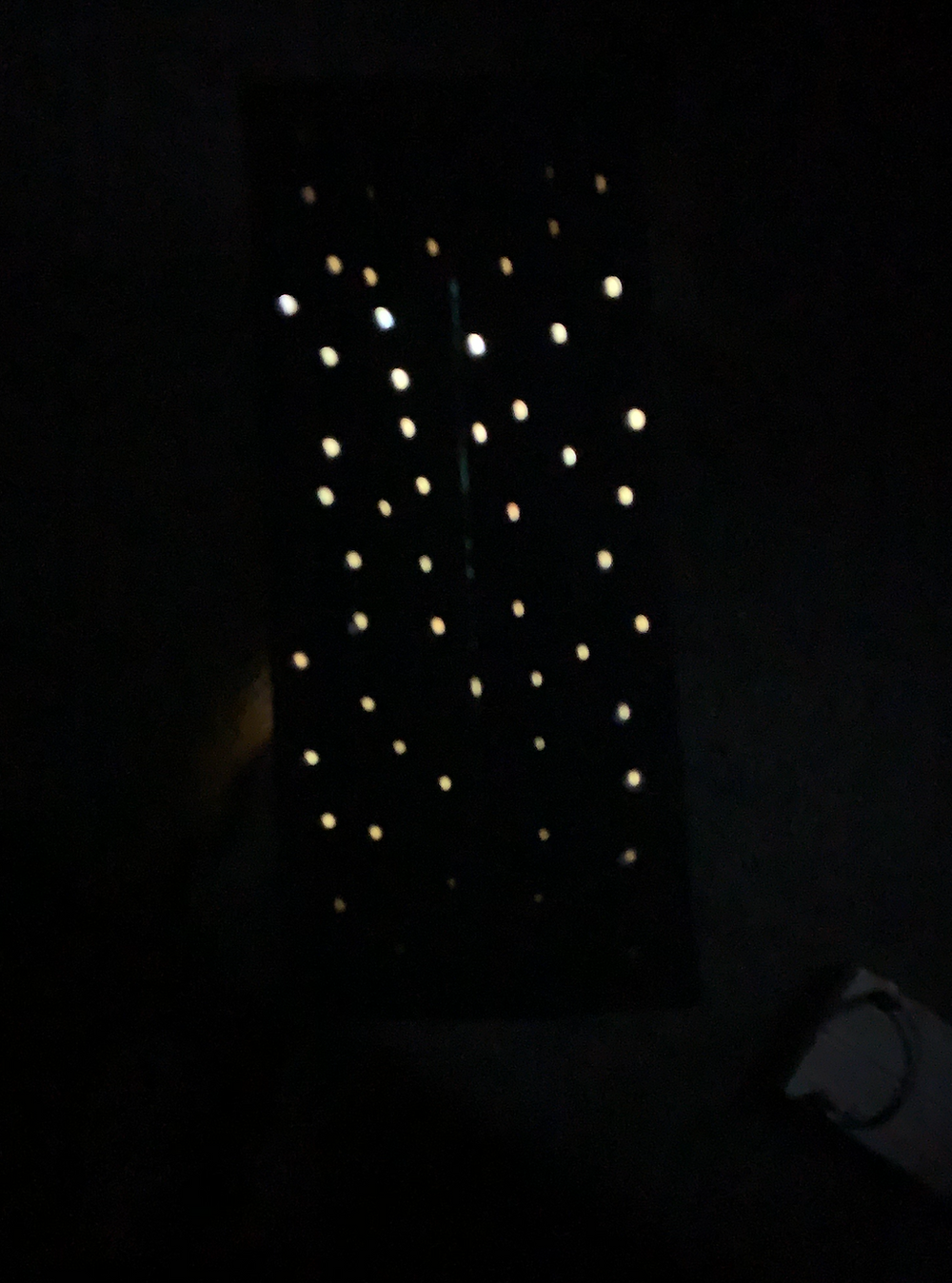 Box with holes that has a LED inside it