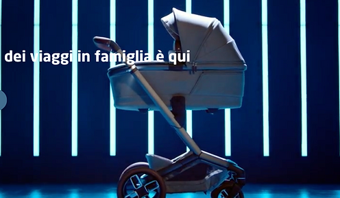 A sleek, modern space with blue lighting and a stroller, possibly representing a high-end lifestyle or shopping environment.