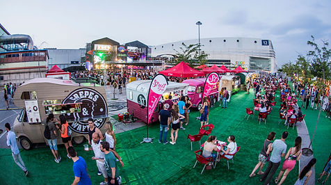 Crowd at the RÃo Babel Festival, enjoying the lively atmosphere with performances and festivities.