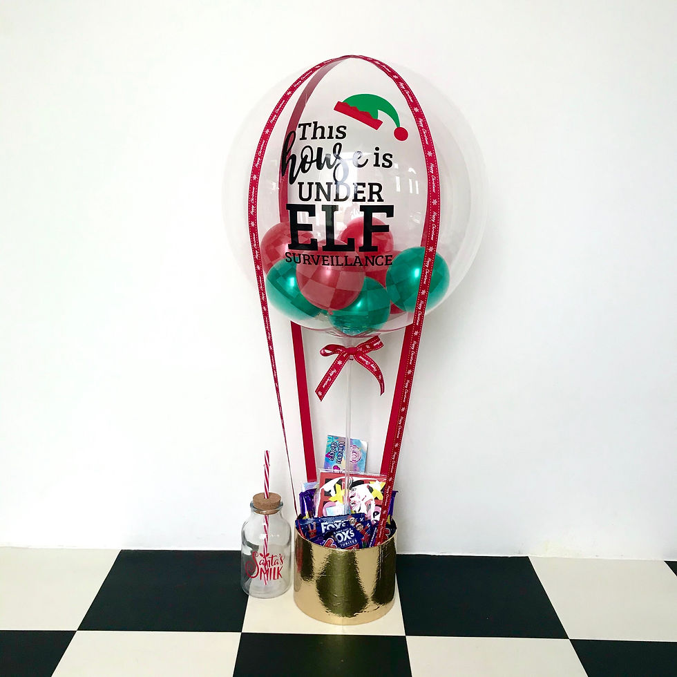 Thumbnail: Elf theme balloon with gifts; This house is under Elf surveillance. Party World Ferndown