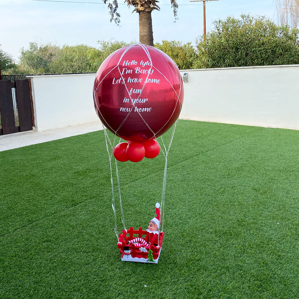 Thumbnail: Red balloon in a hot air balloon basket with text. Party World Ferndown