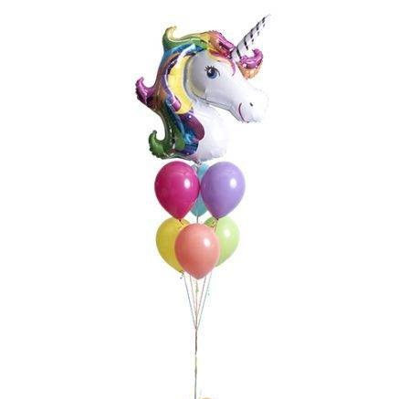 Unicorn balloon bouquet with colorful balloons and a white background.