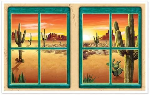Desert landscape scene seen through two teal windows during a sunset