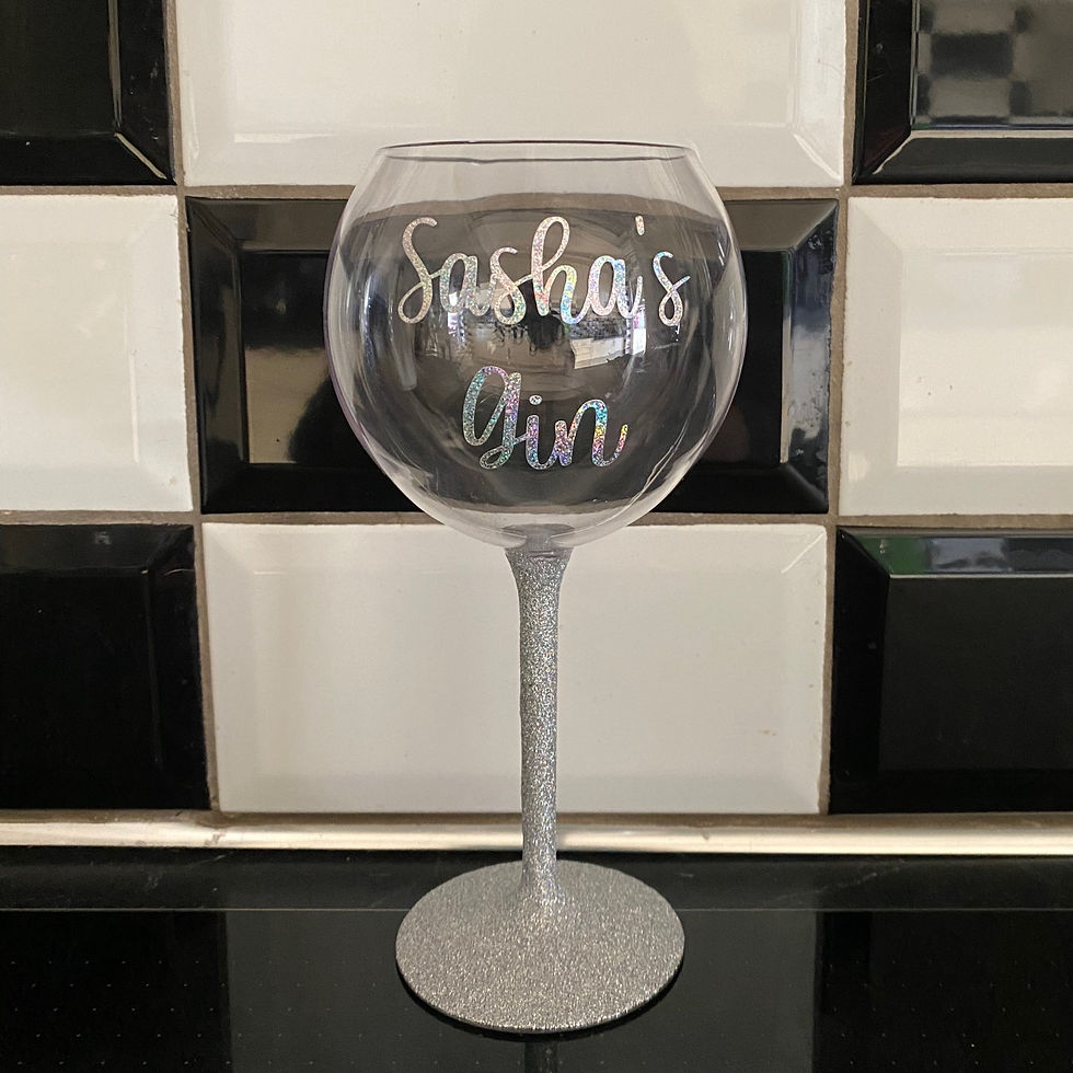 Thumbnail: Glittering gin glass reads "Sasha's Gin" against black and white tiled background.