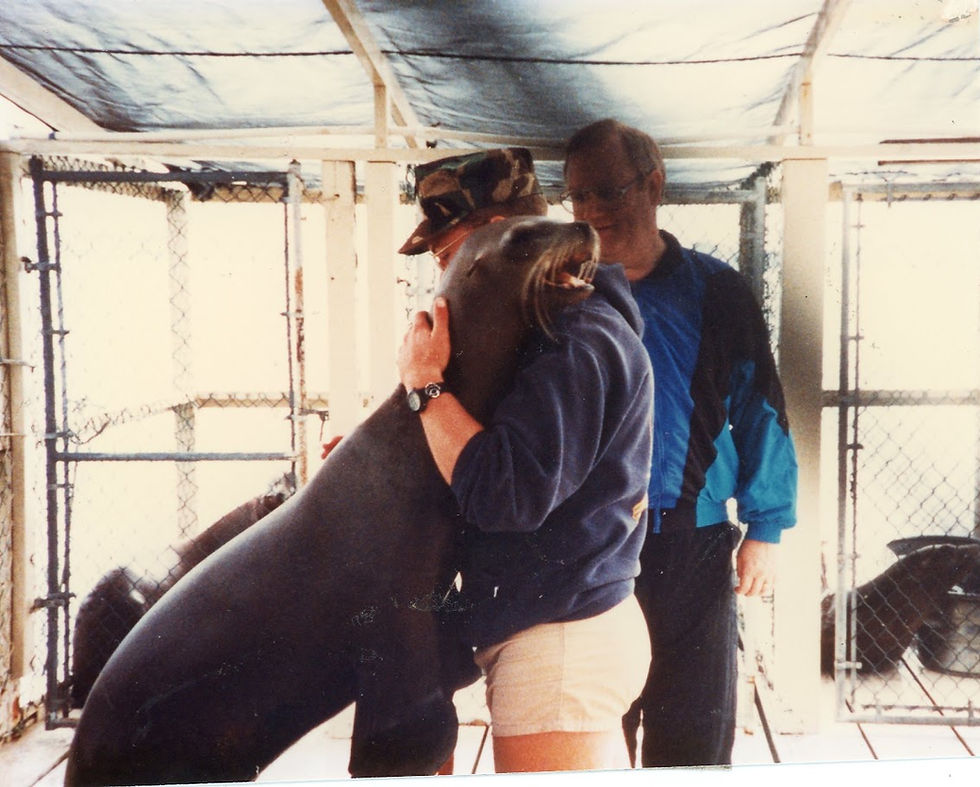 Thomas and Sea Lion Hugging.jpg