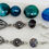 Thumbnail: Silvertone and glass drop earring