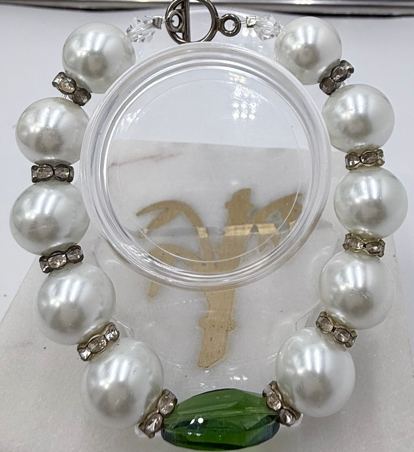 White pearl, beads, and emerald beads bracelet