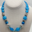 Thumbnail: Blue glass bead with silver tone beads,  and spike pendant