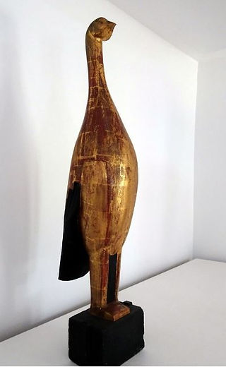 "L'oiseau d'or", sculpture en bois doré de Zadkine, 1924