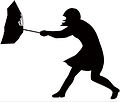 Silhouette of a man suffering from strong wind