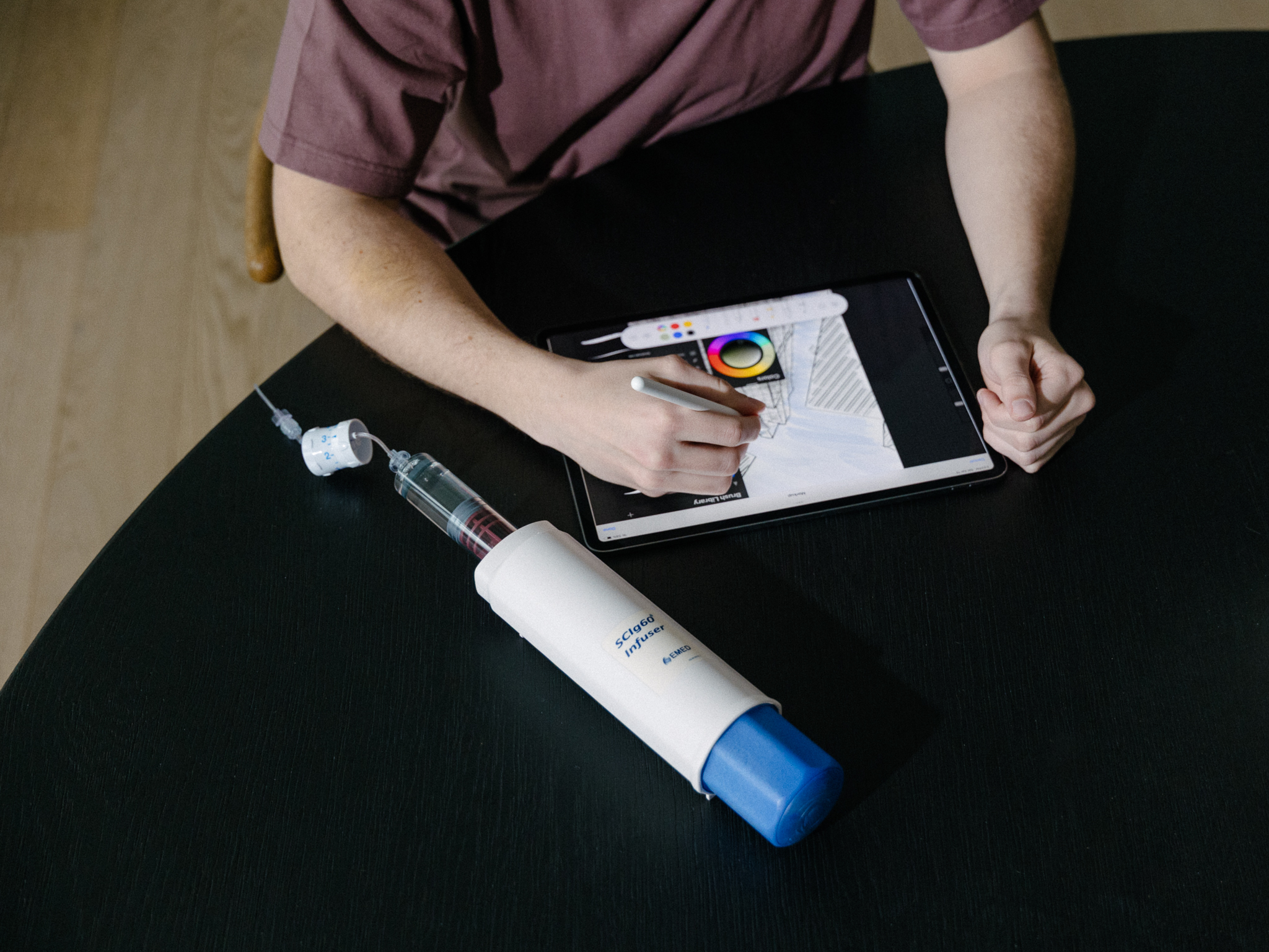 Patient using infusion device