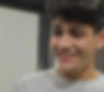 a little boy is laughing