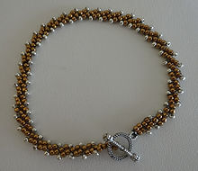 084 Bracelet br w silv.JPG