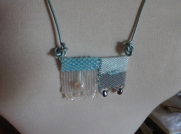 178 Necklace Tapestry Coll. Aqua, white on aqua cord.JPG