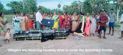 Villagers are receiving tarps