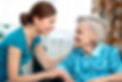 Caregiver takes care of elderly woman with dementia in her own home.