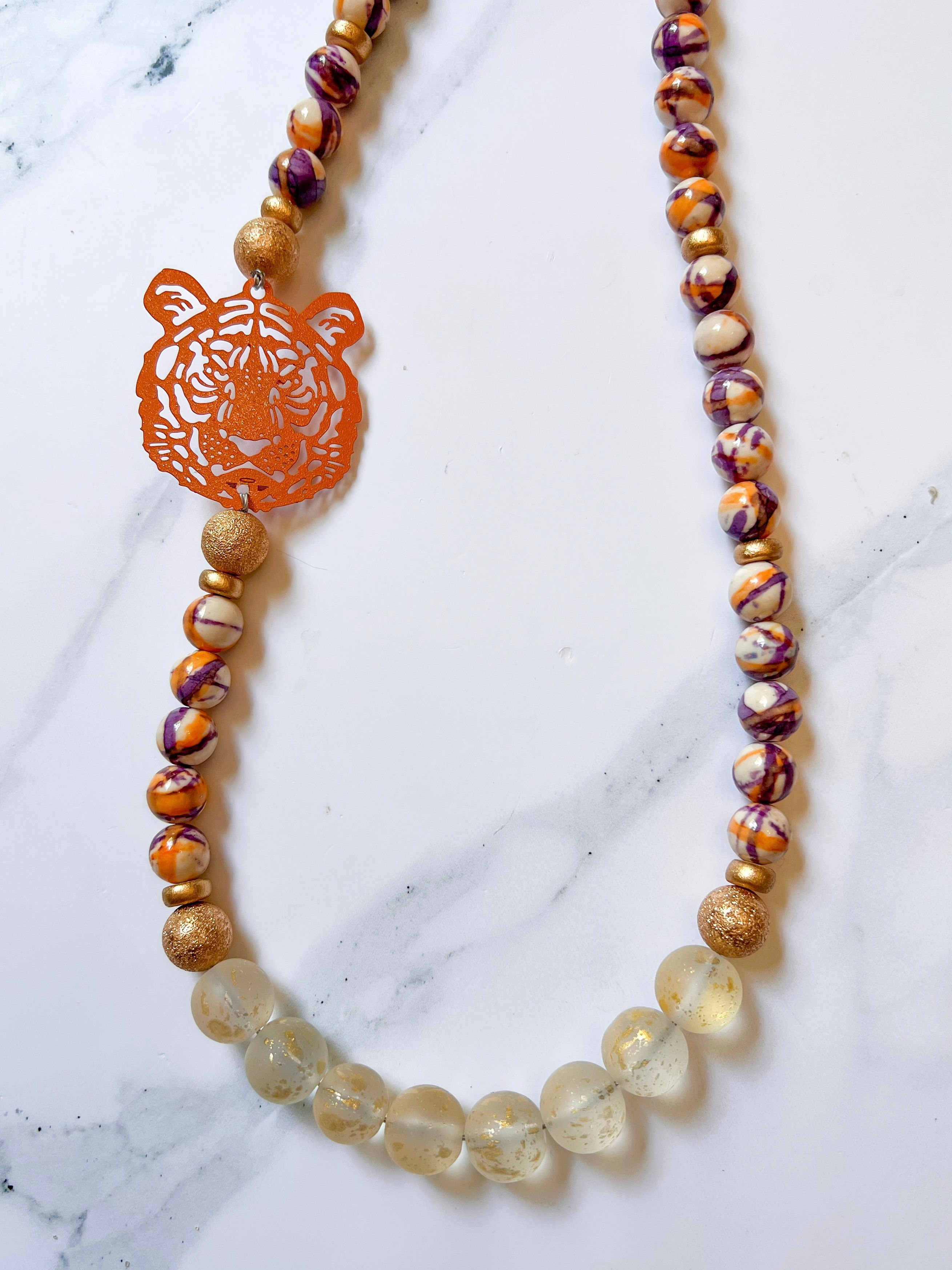 Long beaded tiger head necklace