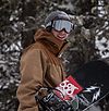 Snowboarder mit Ausrüstung